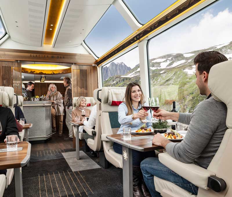 Passengers travelling in Excellence Class on the Glacier Express