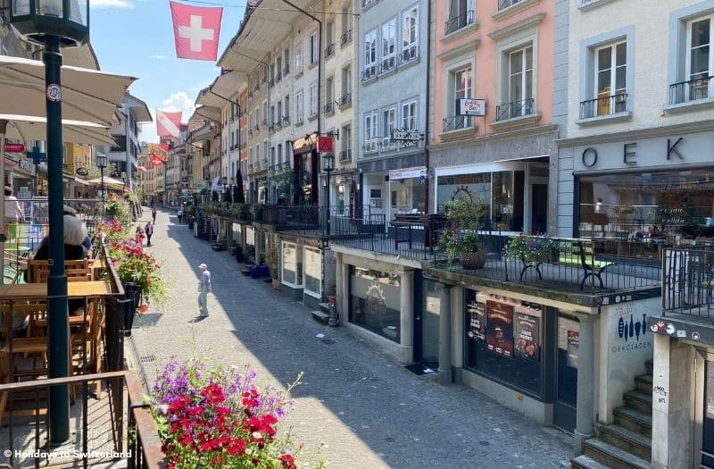 Buildings line a street in Thun Old Town